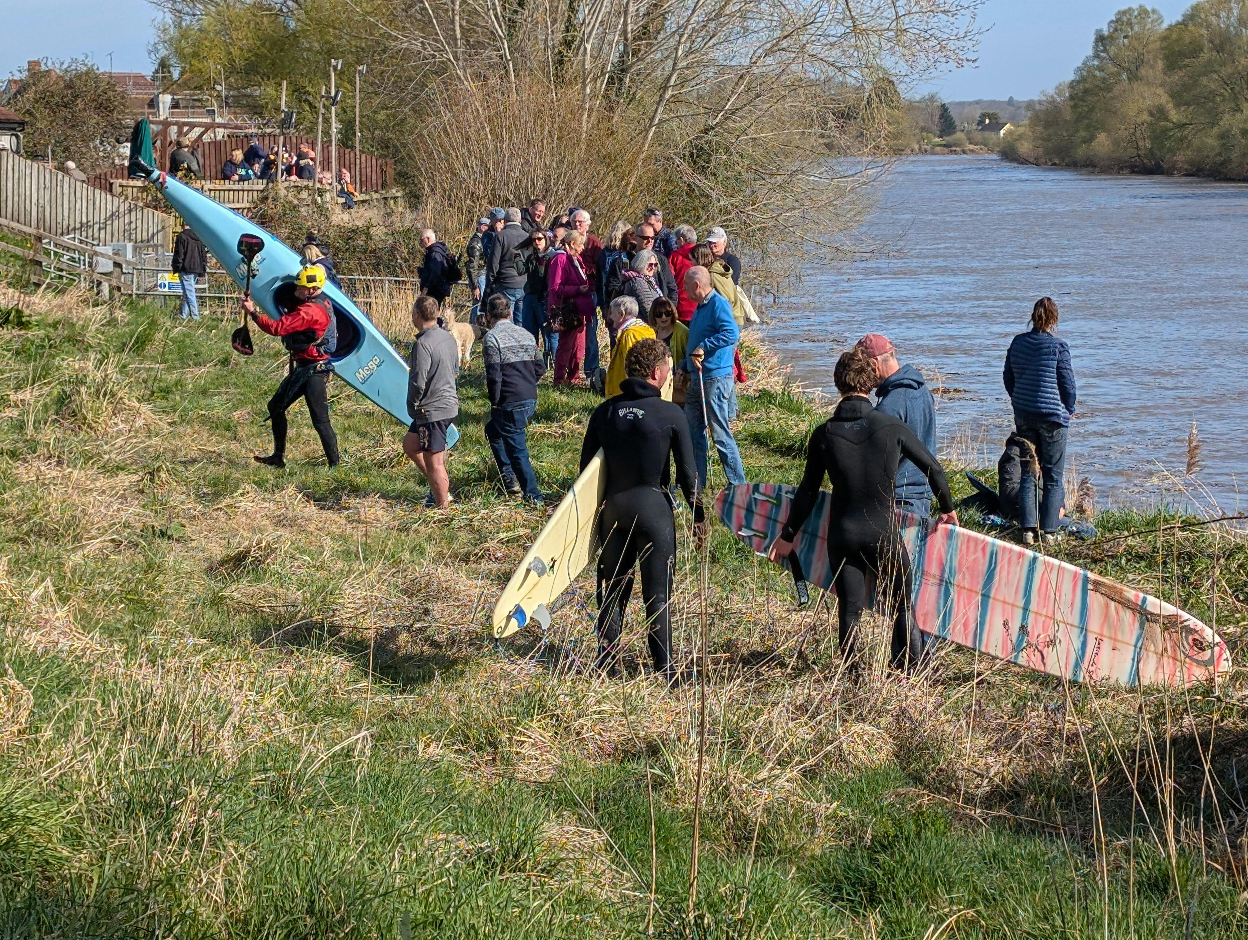 Surfers preparing for the severn bore